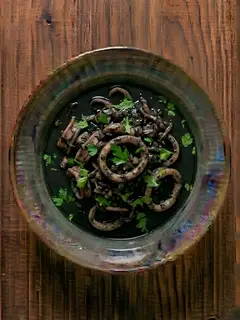 Calamares en su tinta rápida