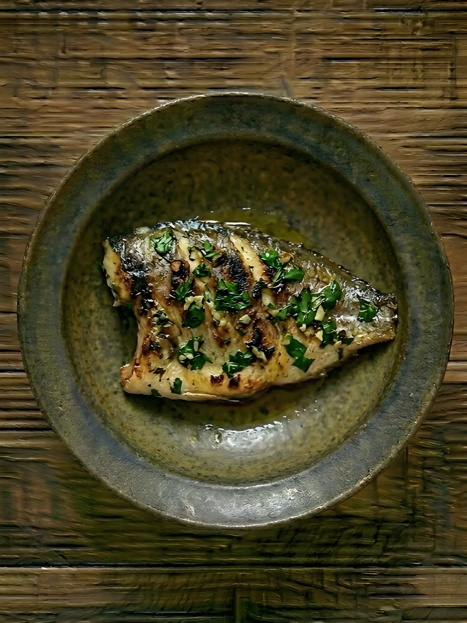 Dorada a la plancha con ajo y perejil