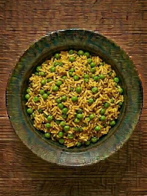 Guisantes congelados con arroz y curry