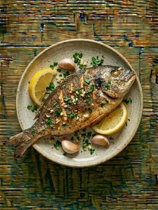 Dorada al air fryer con patatas y hierbas mediterráneas