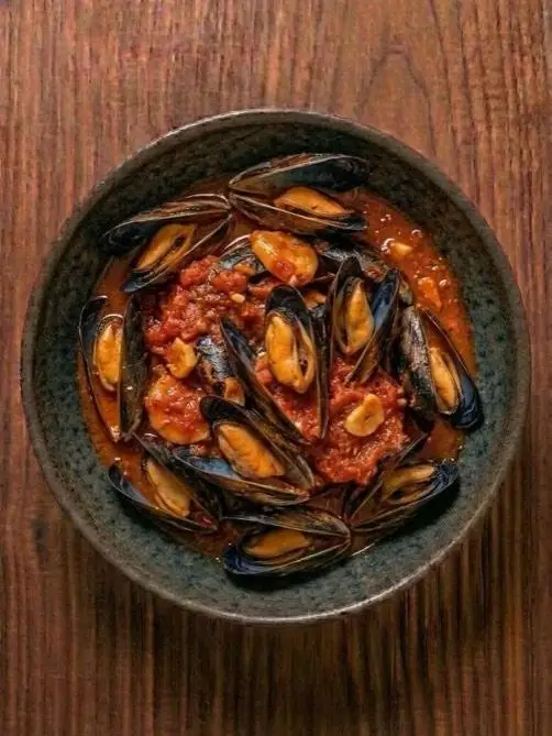 Mejillones en salsa de tomate picante