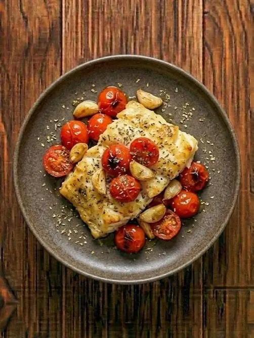 Bacalao al horno con tomates y aceitunas