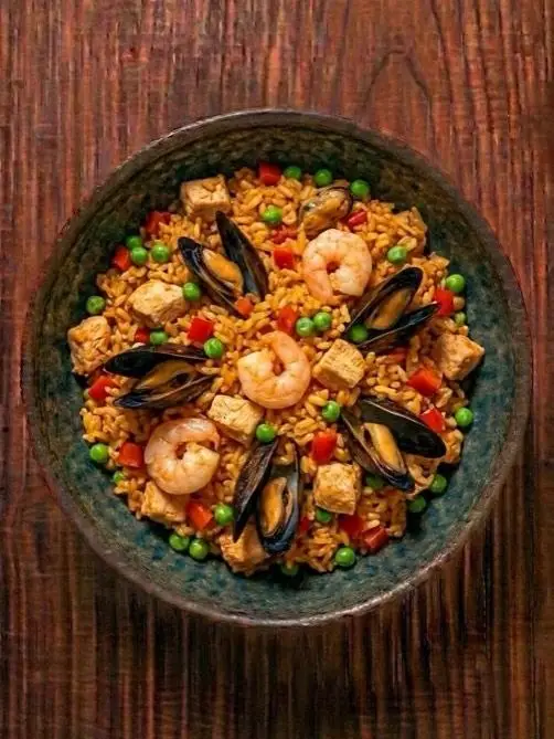 Paella exprés de pollo y marisco