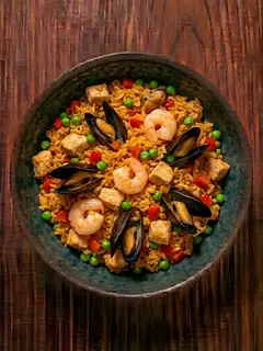Paella exprés de pollo y marisco