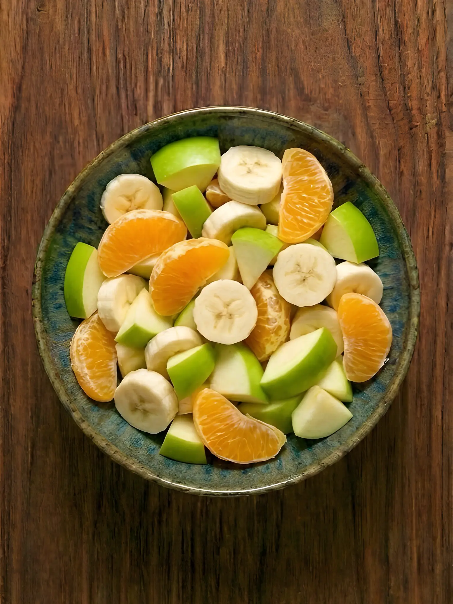 Macedonia de plátano, manzana verde y naranja