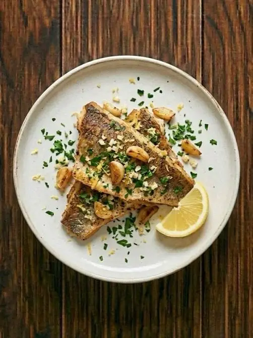 Merluza al air fryer con ajo y limón