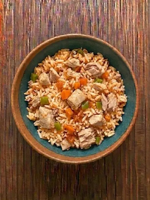 Arroz con conejo y verduras