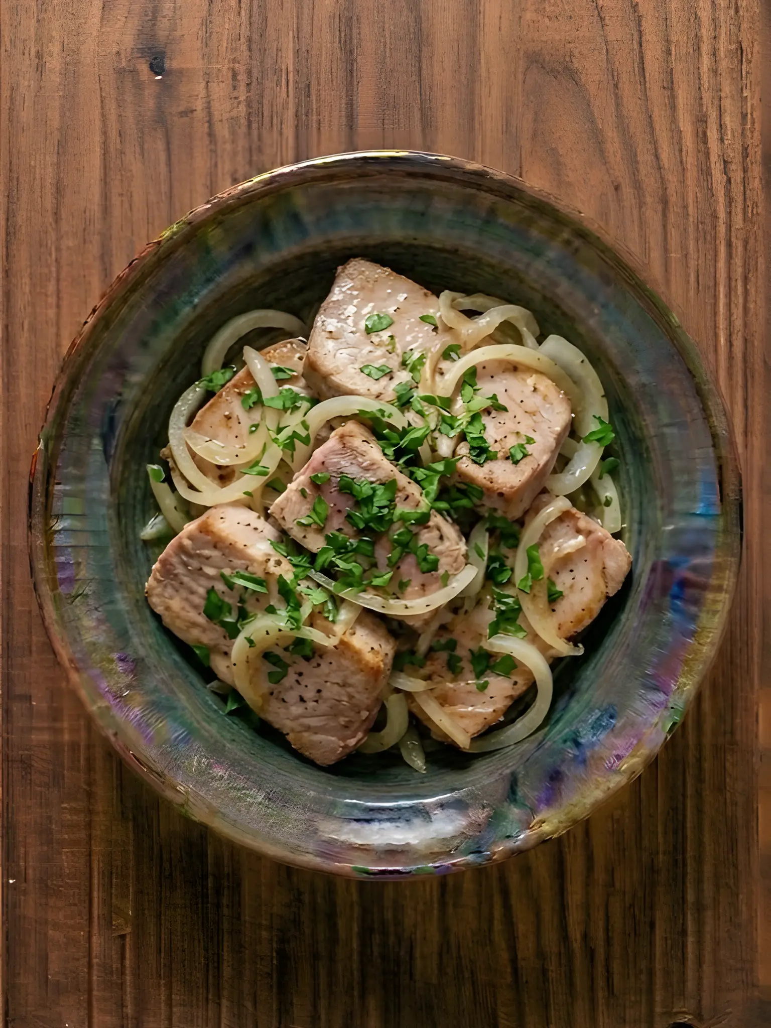 Atún encebollado