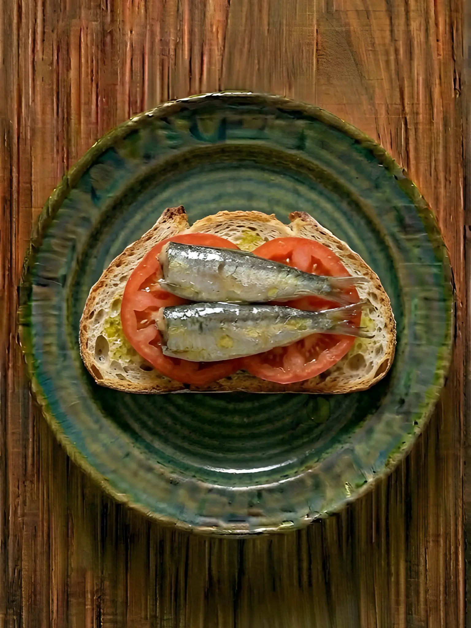 Sardinas en pan con tomate